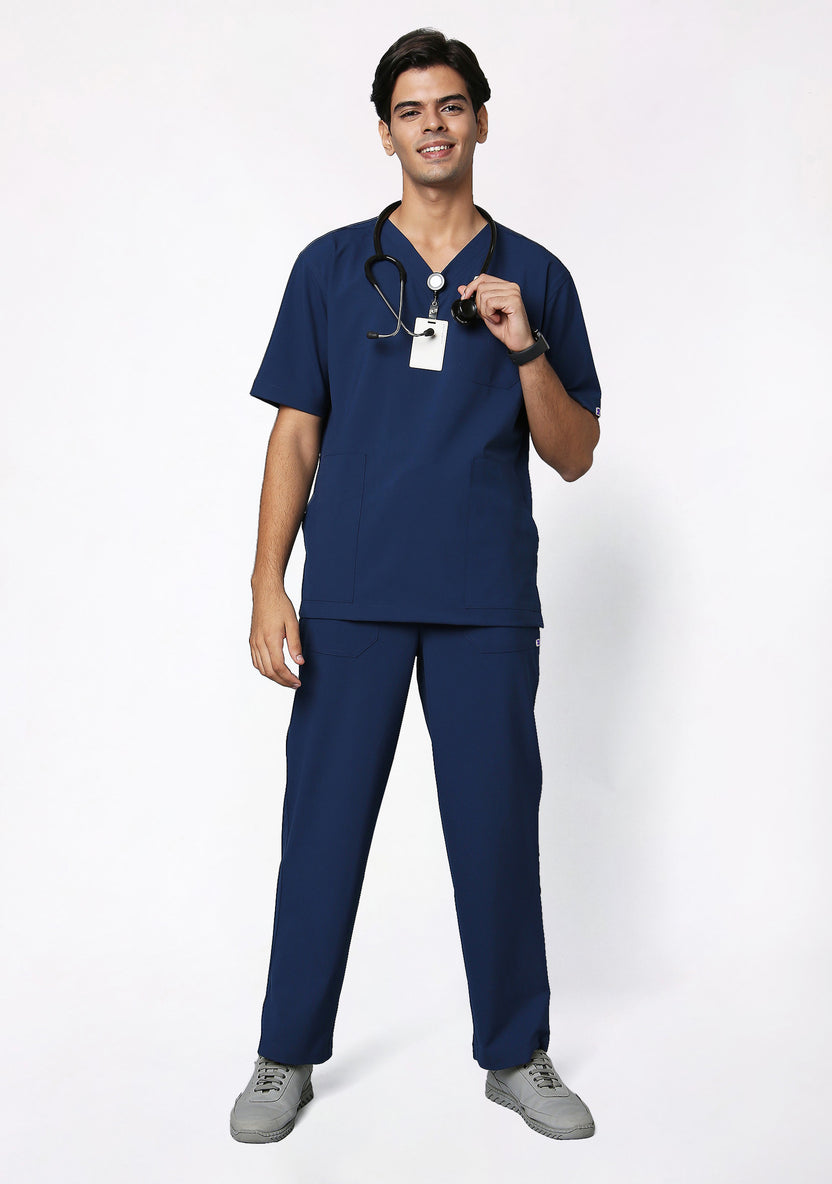 Doctor in Knya Ecoflex scrubs with a stethoscope and ID badge.