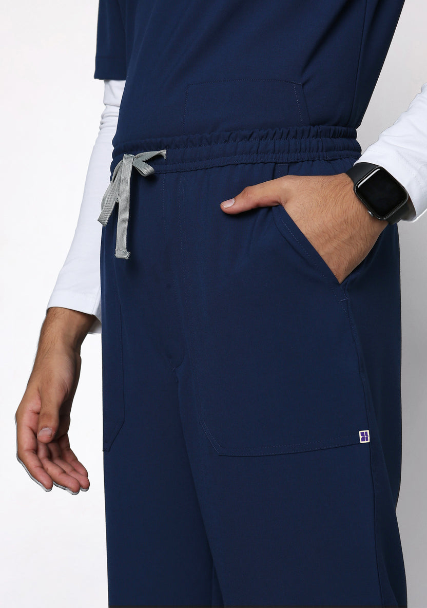 Close-up of the Knya scrub pants' side pocket and drawstring